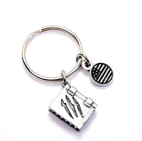 Necronomicon With Teeth Key Chain